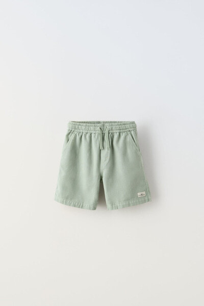 Bermuda shorts with label