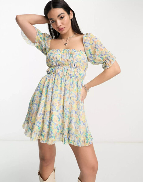 Sisters Of The Tribe mini milkmaid dress with shirred waist and open waist in blue ditsy floral