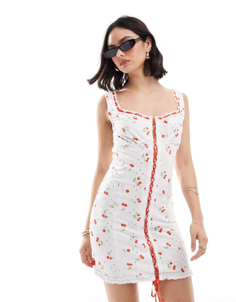 ASOS DESIGN cami strap with corset bodice with ribbon detail broderie mini dress in cherry print