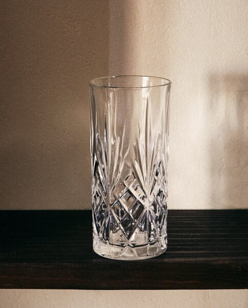 Tall glass with raised design