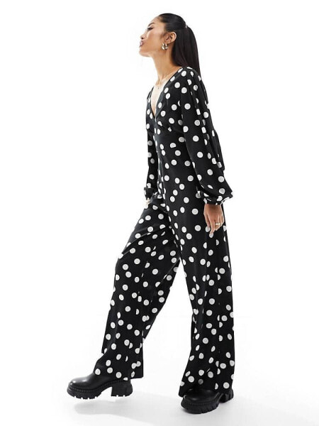 Wednesday's Girl polka dot v-neck jumpsuit in black 