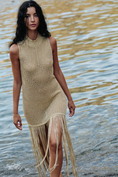 Long knit top with fringing and metallic thread