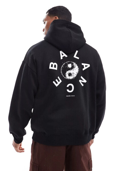 Selected Homme oversized hoodie in black with balance circle backprint