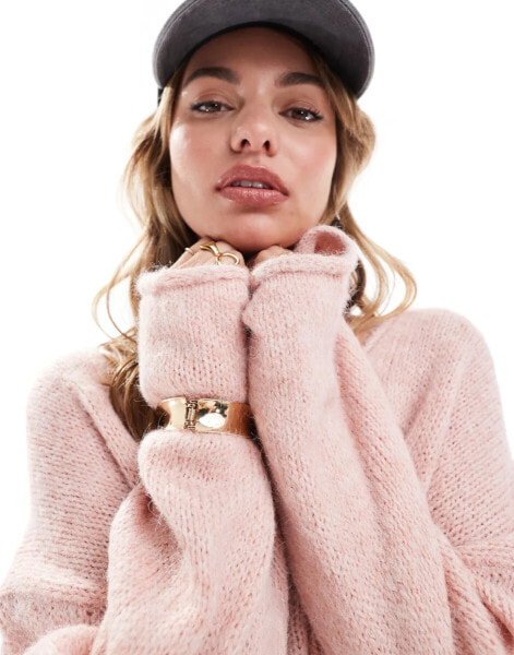 ASOS DESIGN loose knit oversized v neck jumper in pink