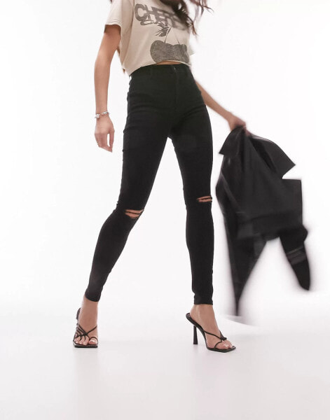 Topshop – Joni – Jeans in Schwarz mit Knierissen