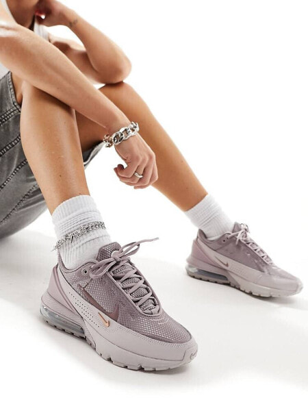 Nike Air Pulse trainers in smokey mauve and violet