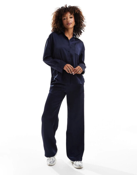 The Couture Club co-ord satin emblem trousers in navy