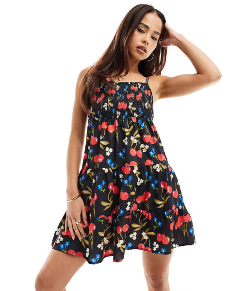 Wednesday's Girl cherry print shirred cami mini smock dress in black