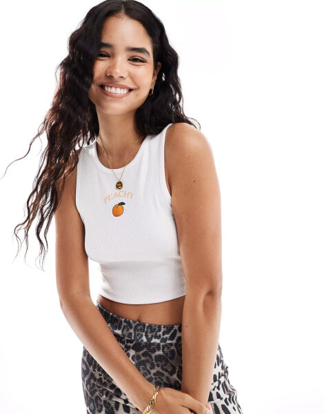 Pieces embroidered ""Peachy"" cropped vest top in white