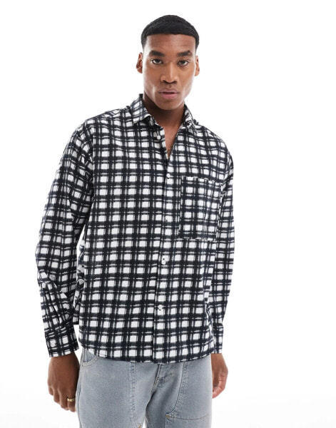 ASOS DESIGN oversized plaid shirt in black and white