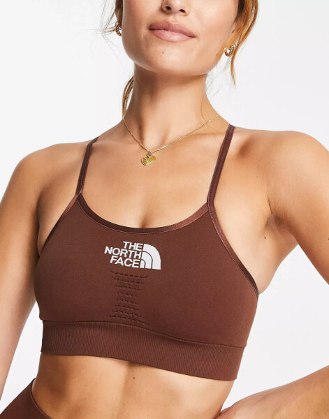 The North Face Training seamless performance sports bra in brown Exclusive at ASOS