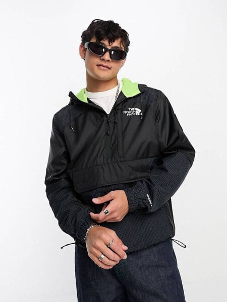 The North Face NSE Convin water repellent overhead anorak in blue and black