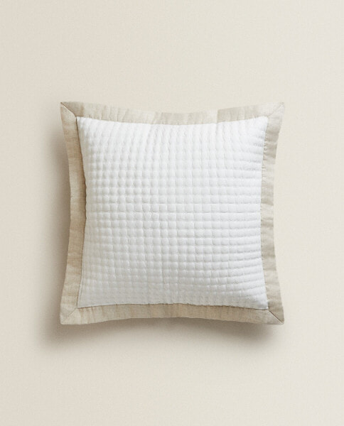 Textured cushion cover with linen border