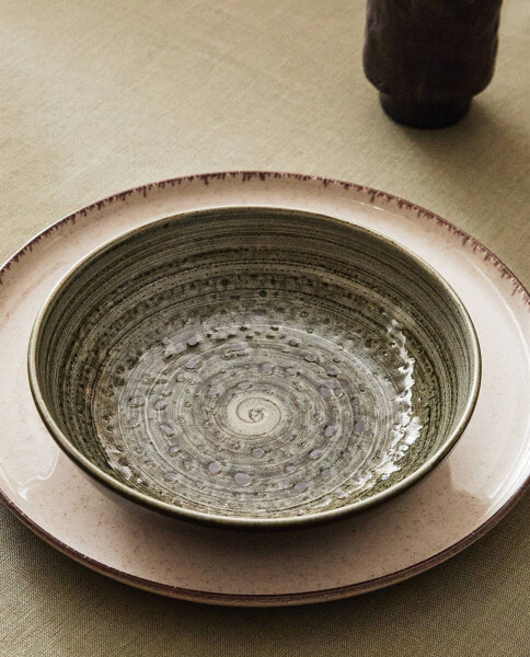 Earthenware soup plate with spiral design