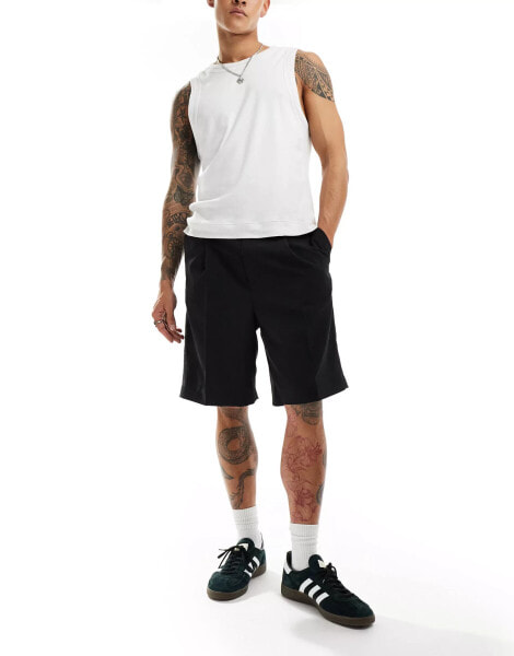 Weekday Uno loose fit tailored shorts in black