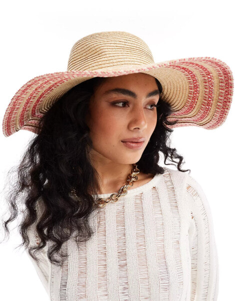 Accessorize wide brim summer hat with pink stitching in natural