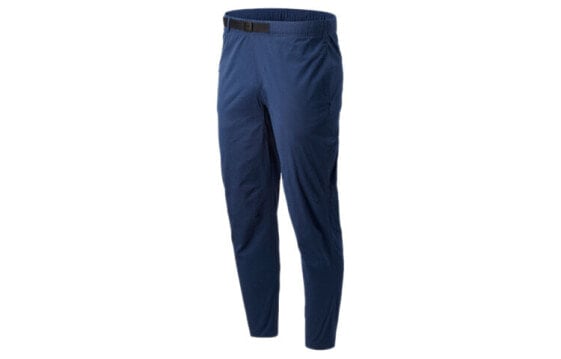 Мужские брюки New Balance модель AMP01504-NGO, цвет Натуральный индиго