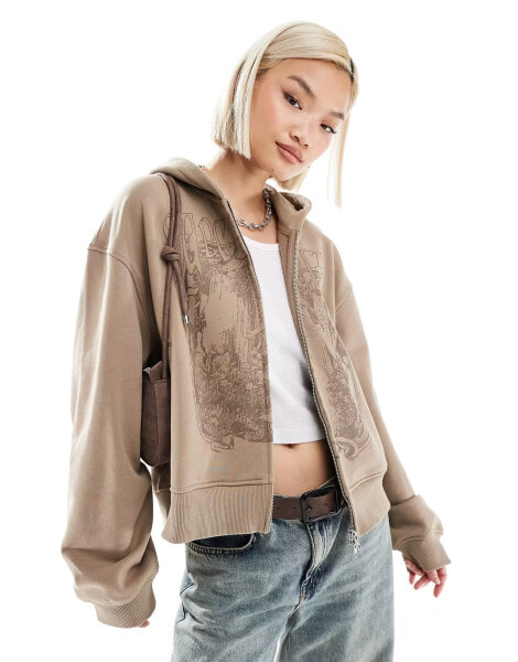 Weekday oversized boxy fit zip through hoodie with fairy graphic print in beige