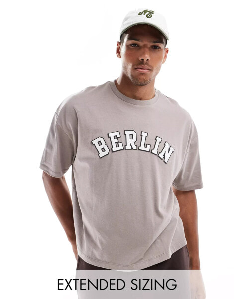 ASOS DESIGN boxy oversized t-shirt with Berlin applique in brown