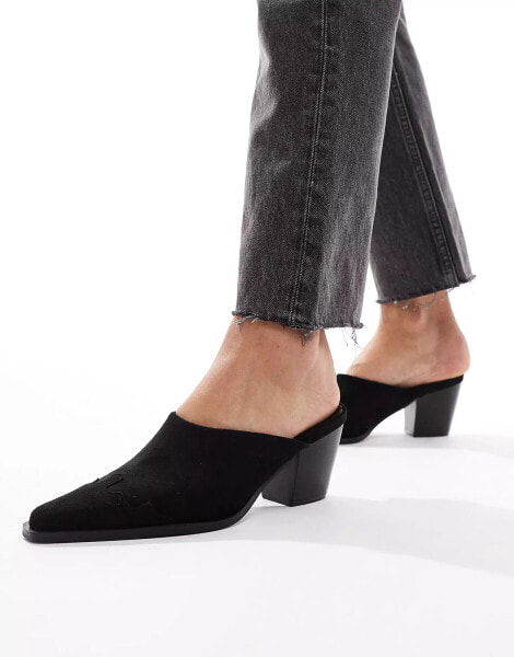 Glamorous western mules in black