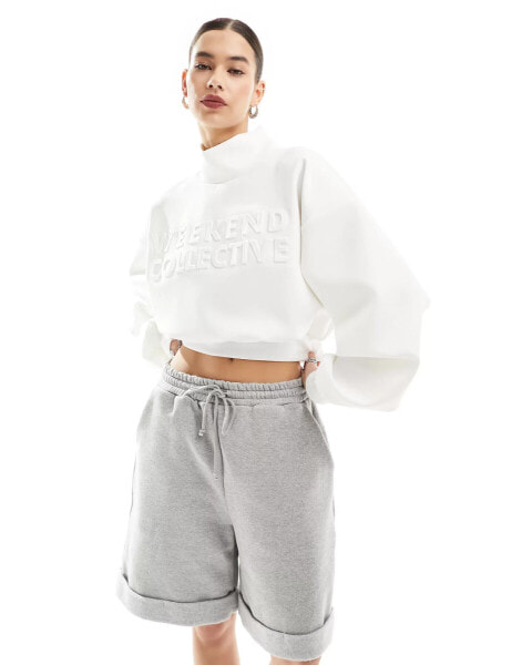 ASOS DESIGN Weekend Collective embossed high neck scuba sweatshirt in white