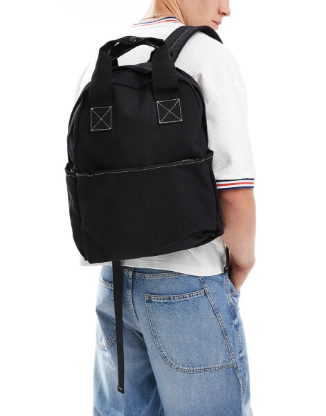 ASOS DESIGN backpack with grab handle and contrast stitch in black