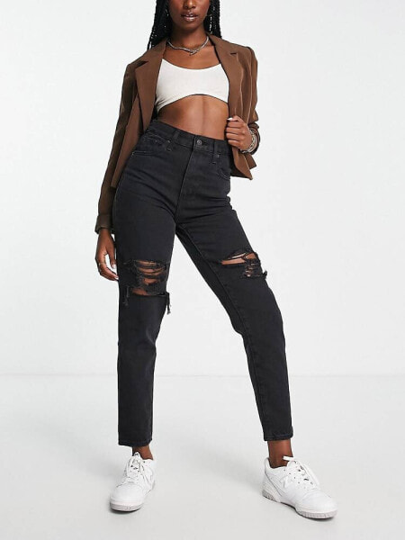 Levi's high waisted distressed mom jean in black 