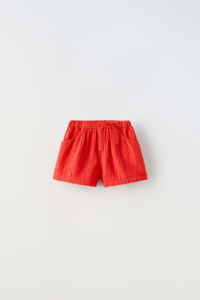 Textured bermuda shorts with tab