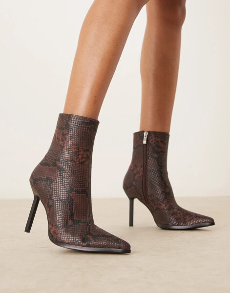 RAID Elvio heeled ankle boots in snake