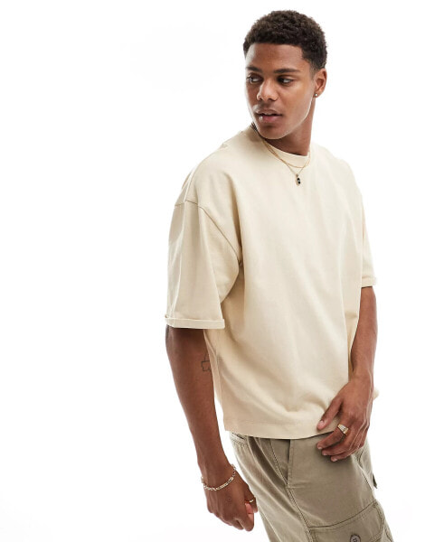 ASOS DESIGN oversized heavyweight boxy rolled sleeve t-shirt in beige