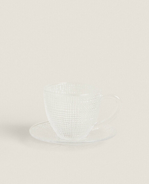 Raised glass coffee cup