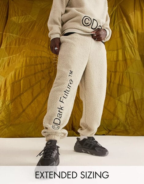 ASOS Dark Future co-ord relaxed joggers in teddy borg with leg logo embroidery in neutral