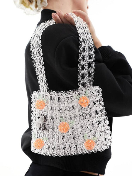 Glamorous beaded handbag with oranges in clear