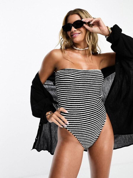 ASOS DESIGN crinkle bandeau swimsuit in mono stripe