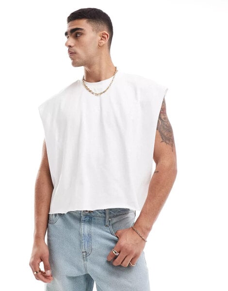 ASOS DESIGN extreme oversized heavyweight cropped sleeveless t-shirt with raw edge in white