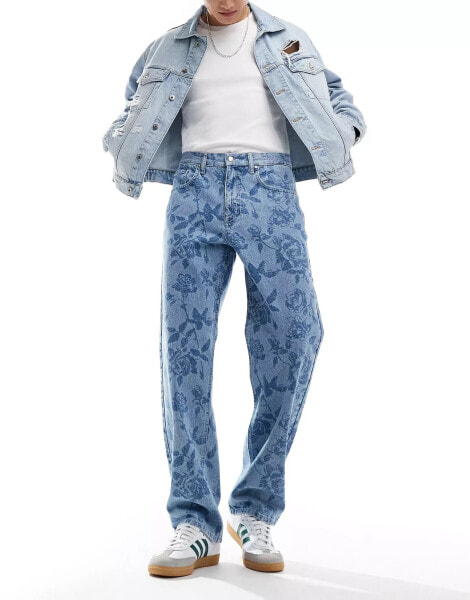 ASOS DESIGN baggy jean in mid wash with all over floral print