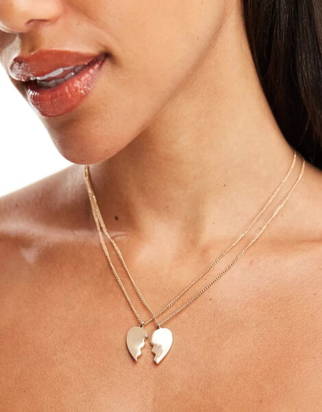 Monki necklace with half heart in gold