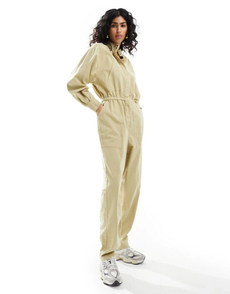 ASOS DESIGN elasticated waist tapered leg jumpsuit with concealed placket in sand