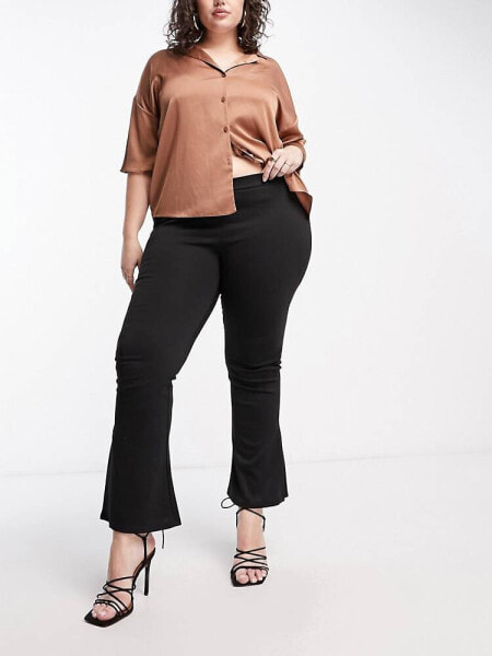 Vila Curve flared trousers with side split in black