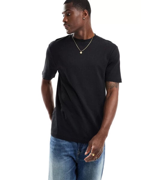 River Island – Studio – Schmal geschnittenes T-Shirt in Schwarz