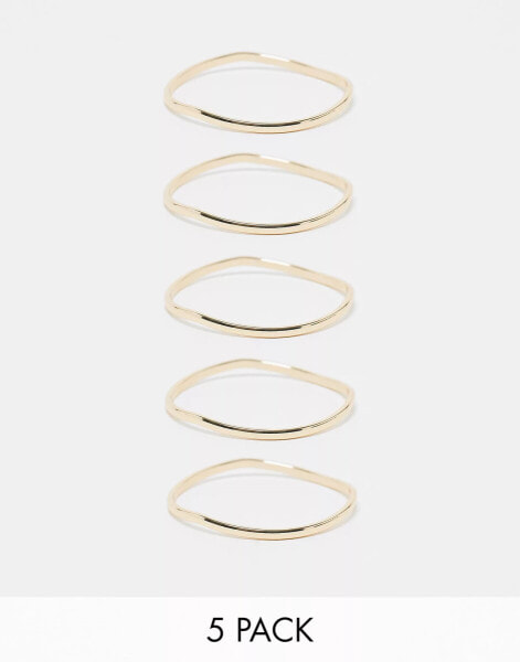 ASOS DESIGN pack of 5 bangles with abstract wave detail in gold tone