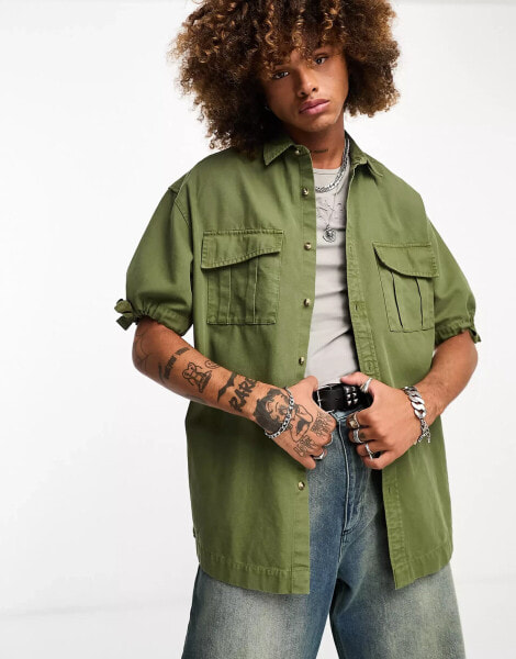 ASOS DESIGN oversized shirt with tie sleeves in khaki