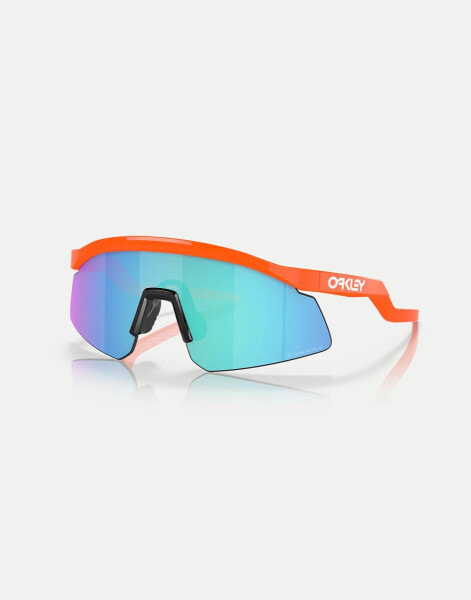 Oakley hydra shield sunglasses in orange with blue mirrored lens in neon orange