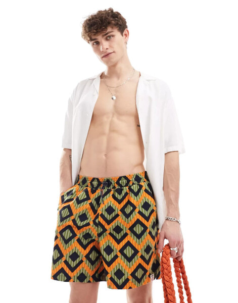 Hunky Trunks geo stripe swim shorts in green and orange