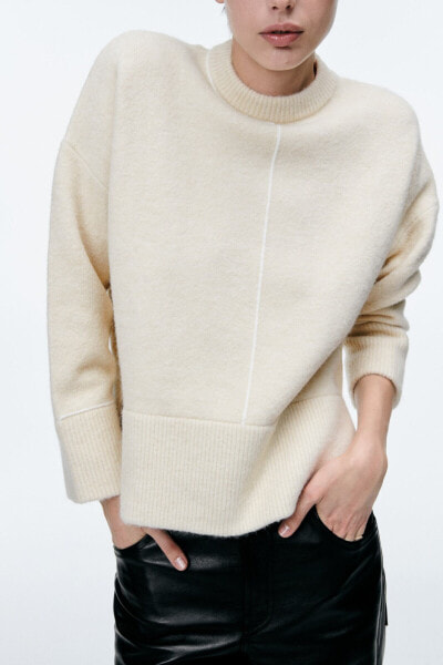 Knit sweater with trims
