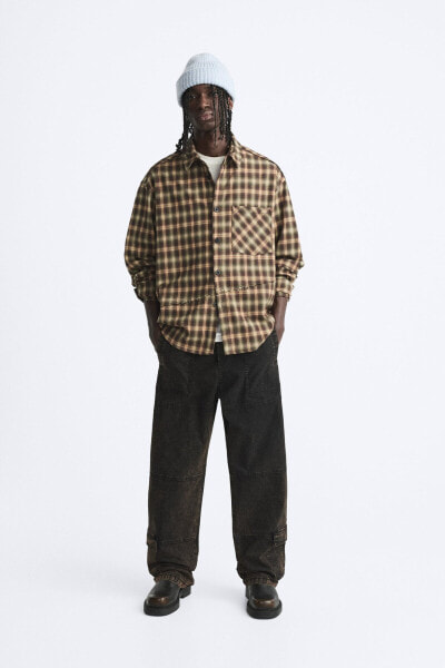 Acid wash cargo trousers