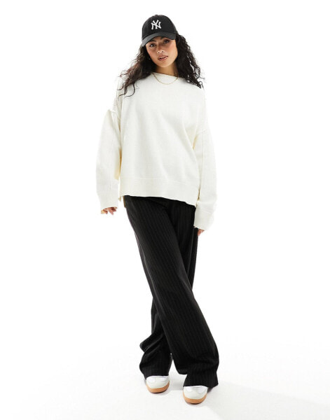 ASOS DESIGN crew neck oversized jumper in cream