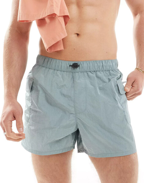 ASOS DESIGN swim short in short length with cargo pocket in grey