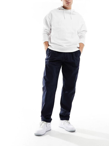 Tommy Hilfiger Tapered Chinos in Dark Blue