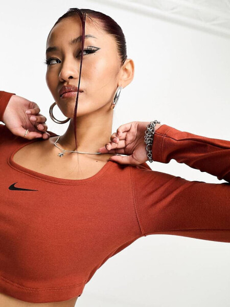 Nike Dance long sleeve crop top in rugged orange